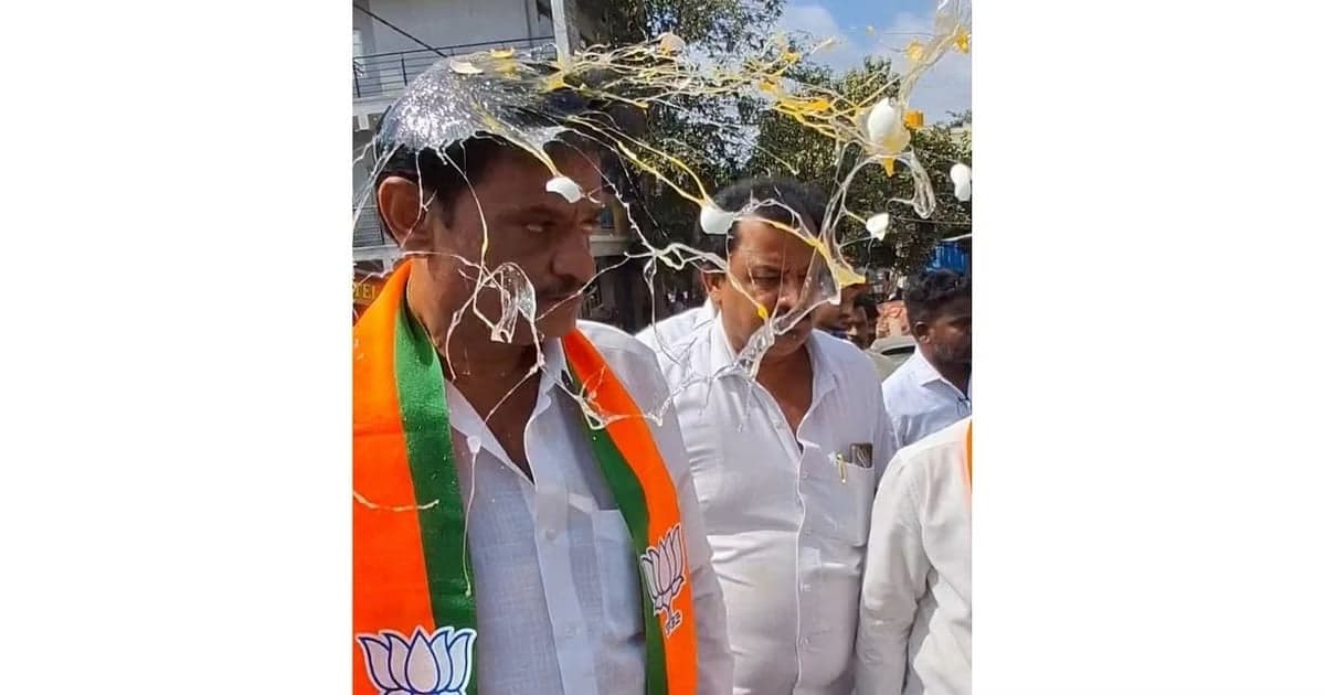 Eggs thrown at Indian BJP leader Munirathna during a public event