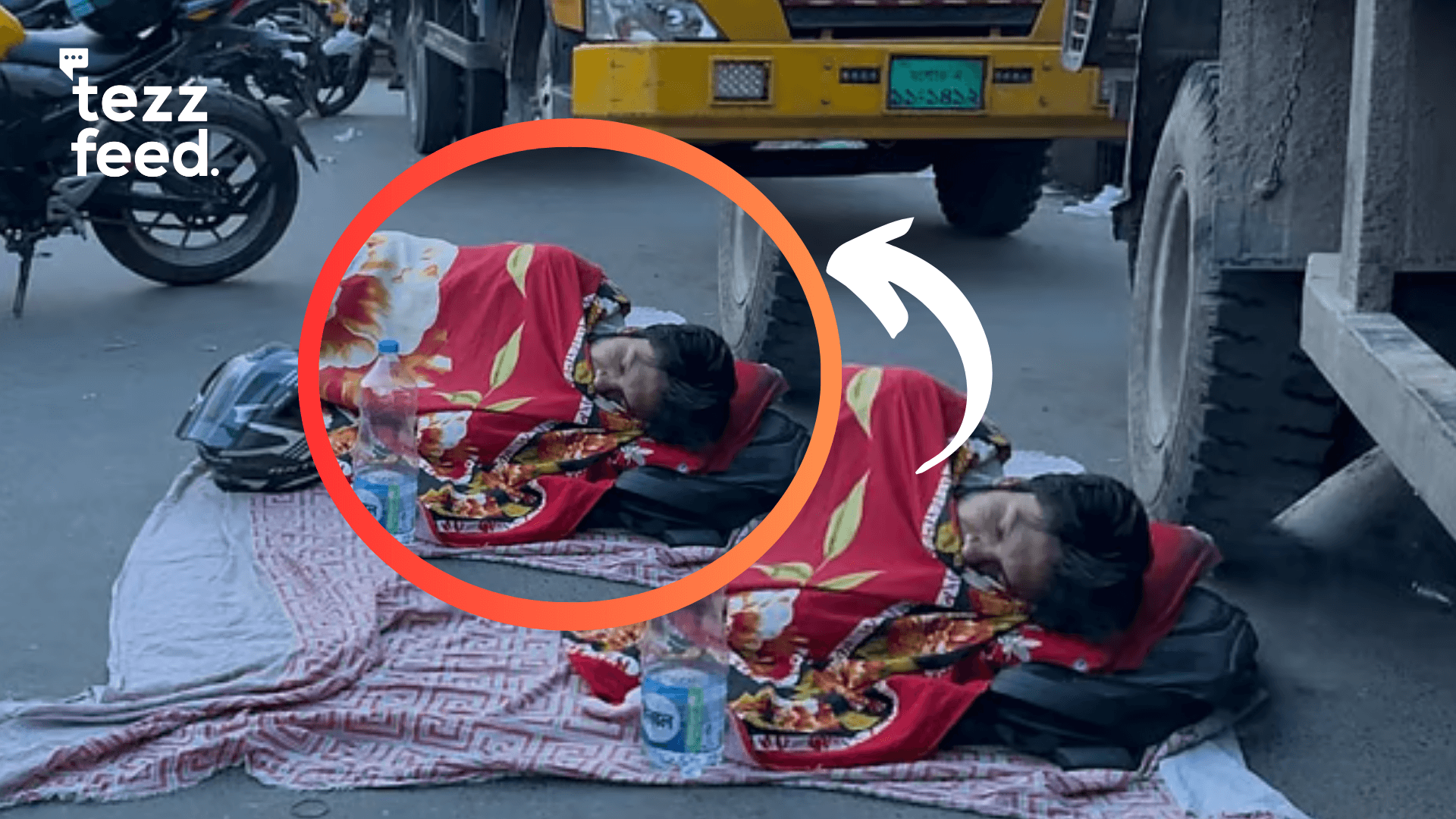 Man sleeps on the street near a fuel pump after waiting 16 hours for fuel